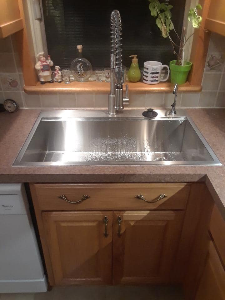 best plumbing installation of sink and faucet